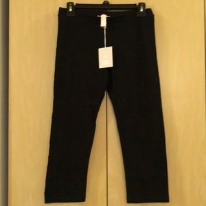 2 pairs of black Capri leggings